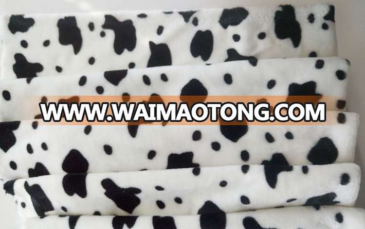 China suppliers cheap wholesale cow print flannel fabric for baby blanket