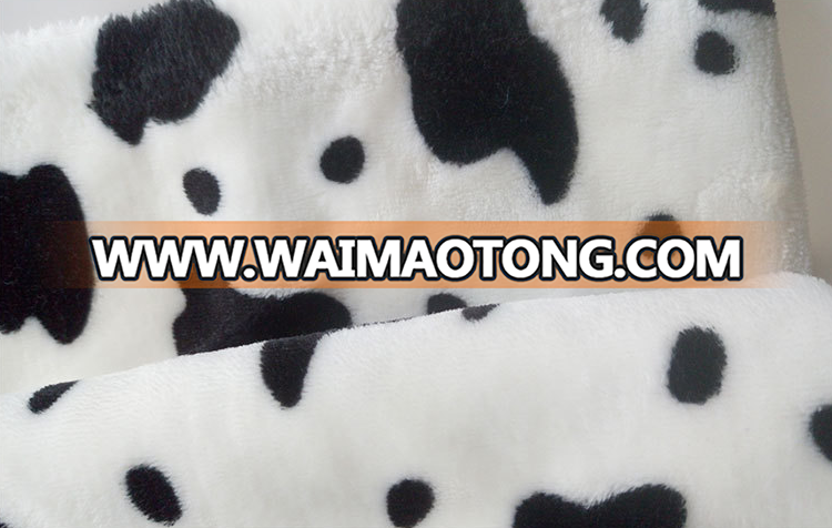 China suppliers cheap wholesale cow print flannel fabric for baby blanket