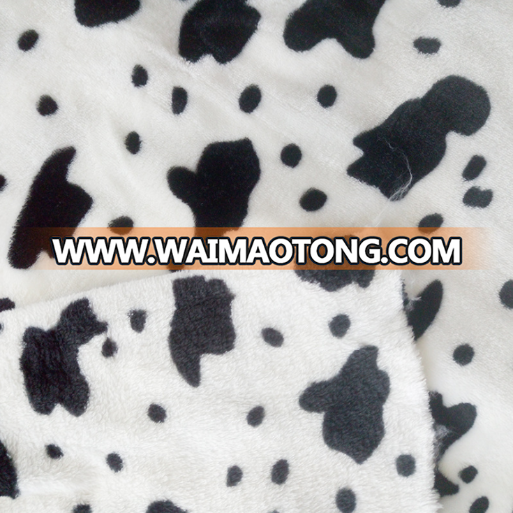 China suppliers cheap wholesale cow print flannel fabric for baby blanket