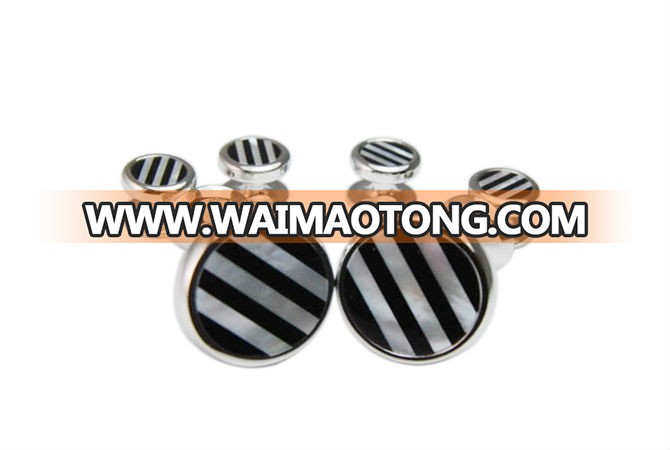 Custom zebra-stripe cuffl<em></em>inks and studs