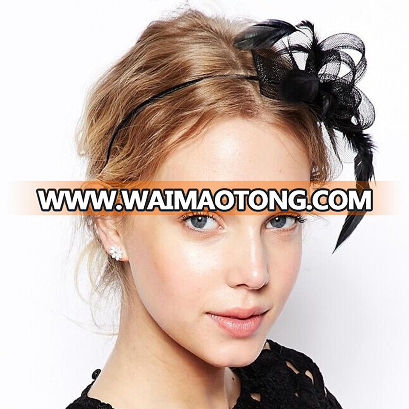 Fancy ladies black bow feather fascinator